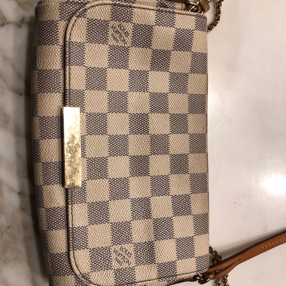 A white checkered cross body